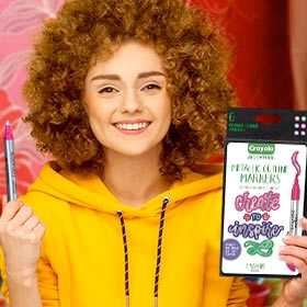 Teenager holding Crayola Metallic Outline Markers