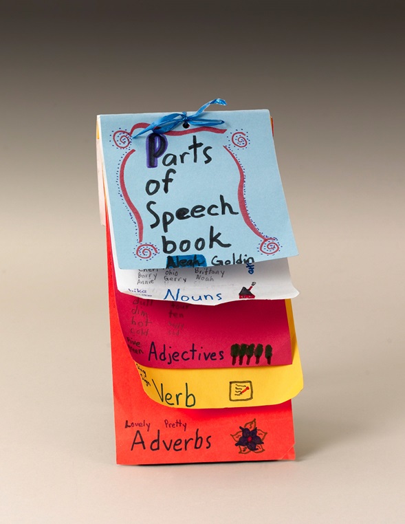 Paper speech banner with word please donate in red color on white