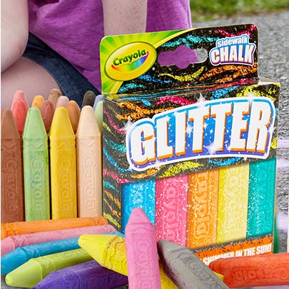 Glitter chalk with child in background