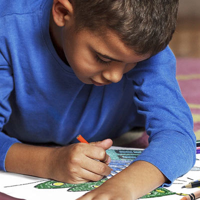 children coloring with crayons